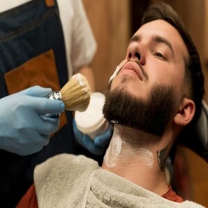 barber-using-shaving-cream-contour-male-customer-s-beard_23-2148985735