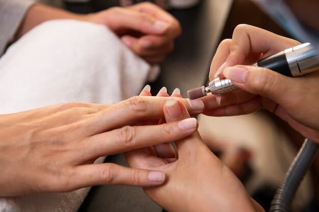 high-angle-woman-getting-manicure_23-2149975499 _1_